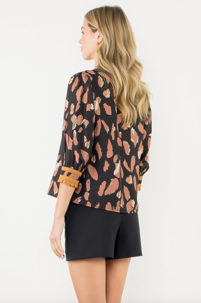 EYELET TRIM SPLIT NECK PRINT TOP - BLACK